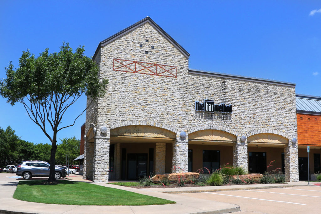 Front of building at the bar method plano